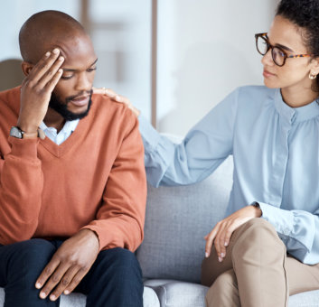 therapist comforting patient