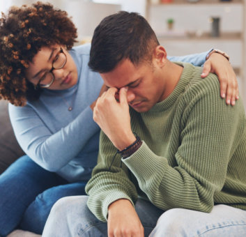 therapist comforting patient